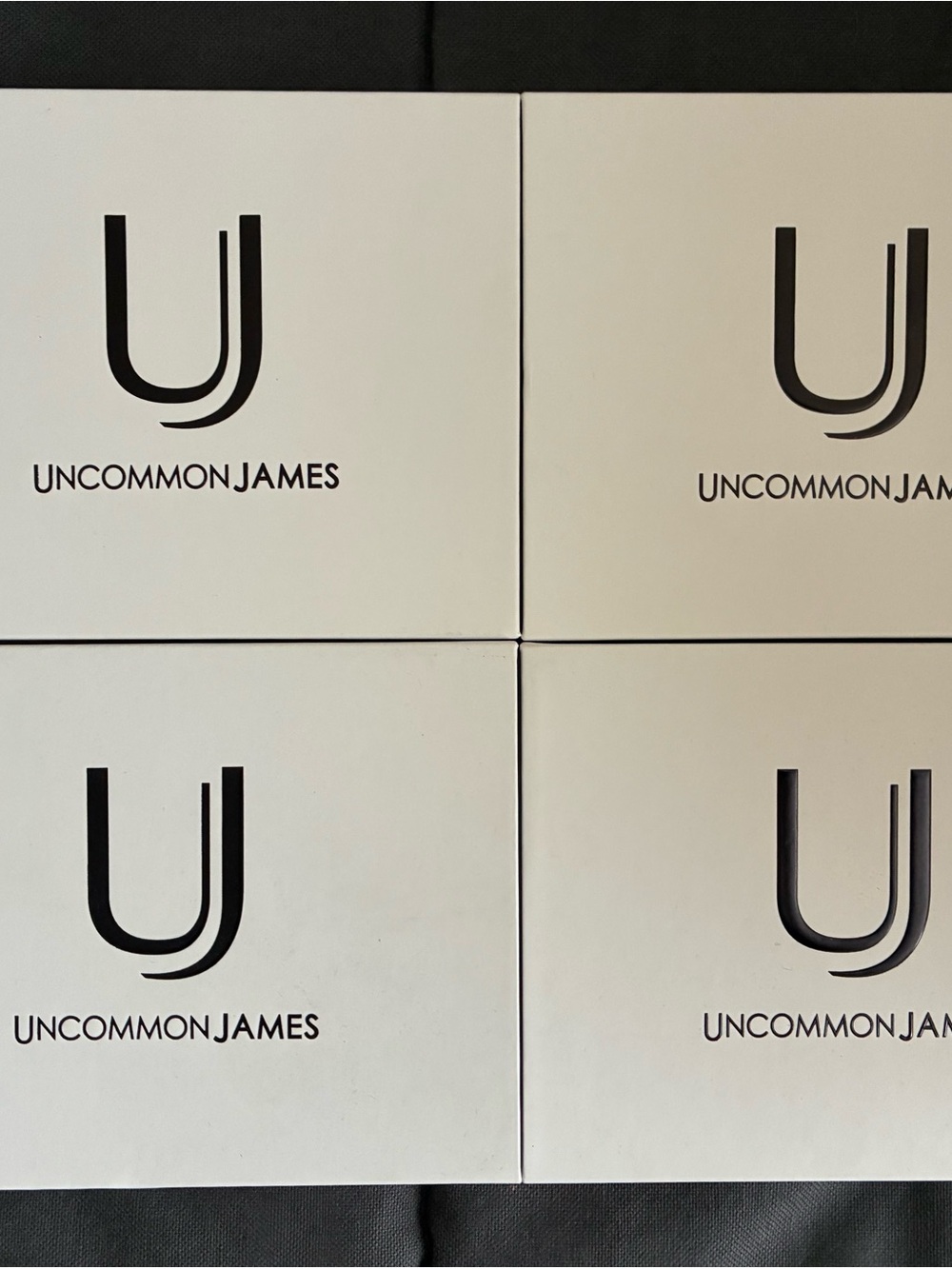 Uncommon James Branded Set of Four Empty Boxes - White and Black Logo